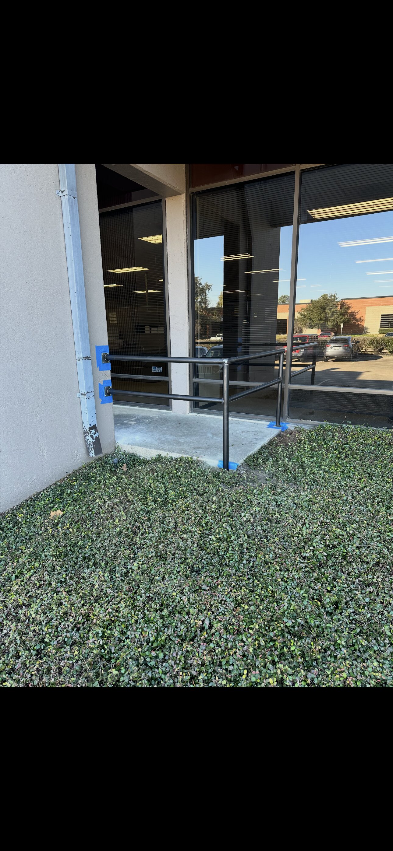 Steel handrail installed at commercial entry